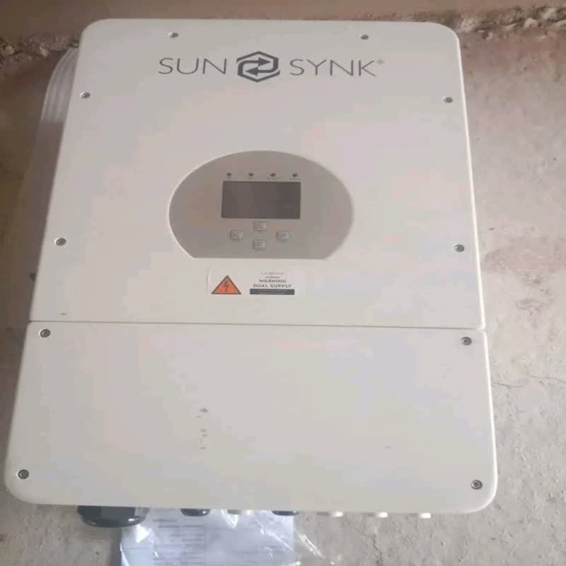 A Sunsynk 8kW hybrid inverter mounted on a wall.