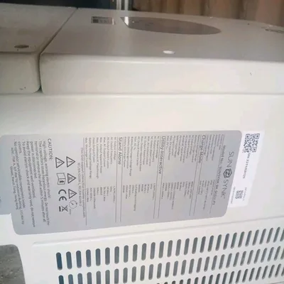 View 2 of 3, The Sunsynk 8kW hybrid inverter seen from the side, showing the cooling fans